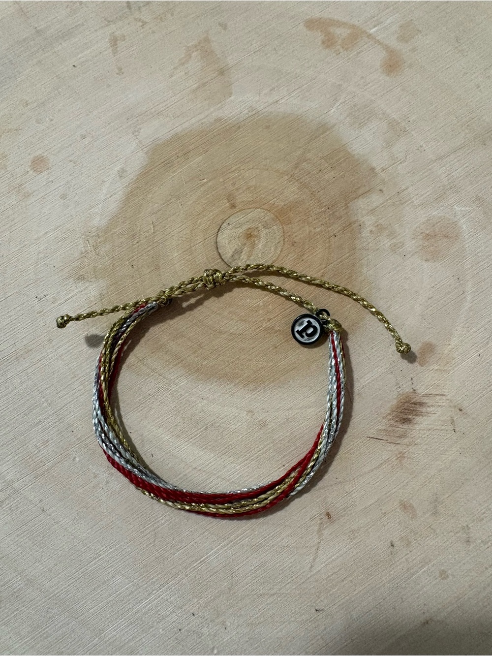 Pura Vida gold, silver & red adjustable bracelet